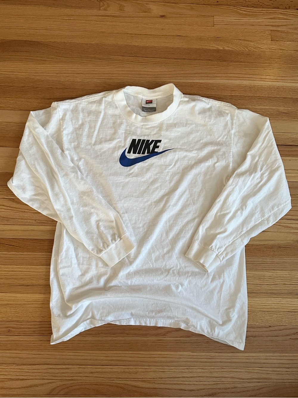Nike White Long-Sleeve Tee with Blue Swoosh Logo
